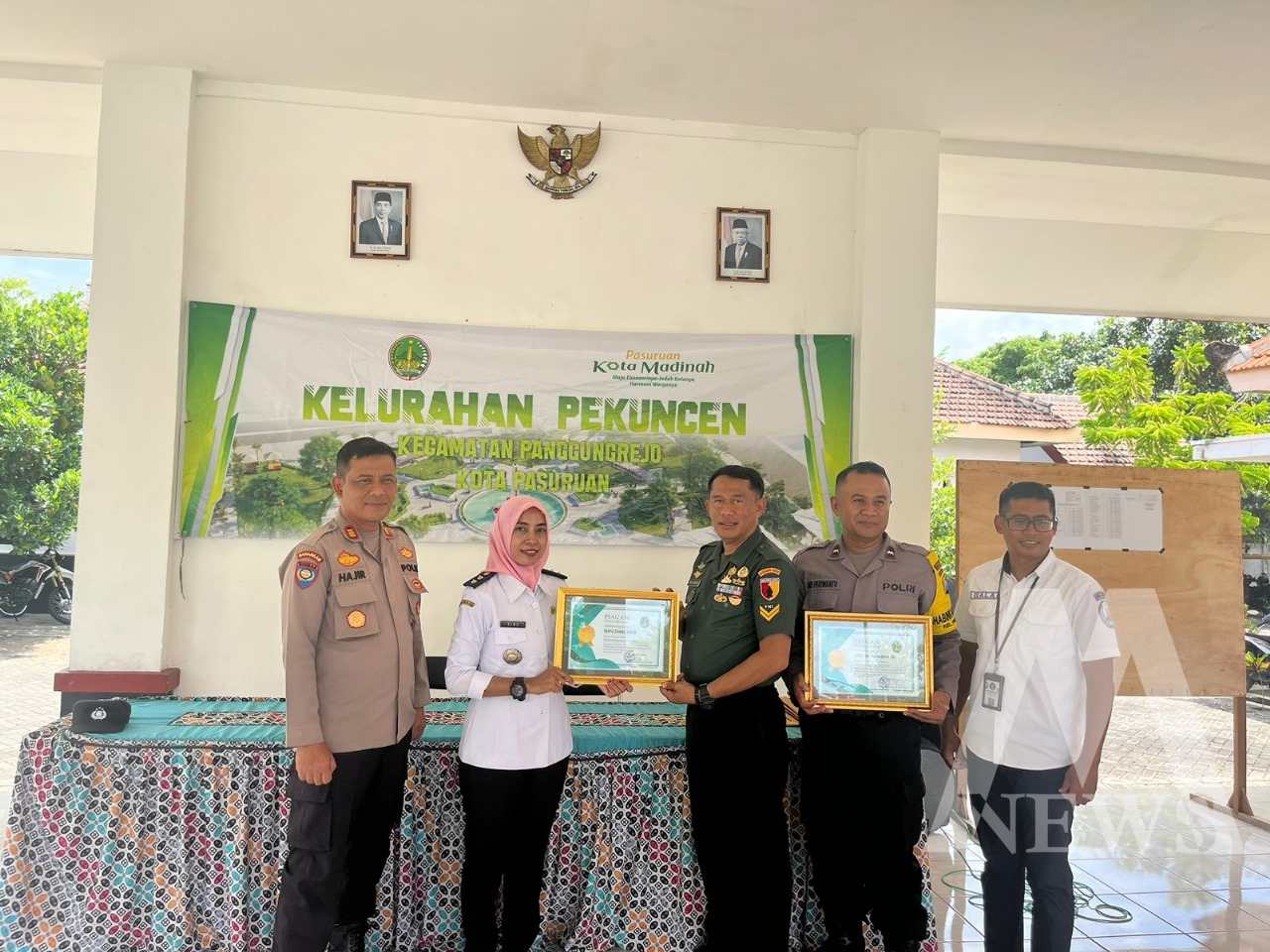 Polisi RW Polres Pasuruan Kota dan Babinsa terima penghargaan