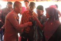 Kapolres Mojokerto AKBP Dr. Ihram Kustarto saat salurkan Bansos