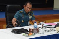 Sekdisdikal, Kolonel Laut (E) Dr. Frankie Oktolim Madethen