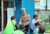 Kasat Lantas Polresta Malang Kota Kompol Aristianto Budi Sutrisno bersama Driver Ojol dan Kamling Udara