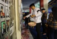 Kapolres Malang AKBP Putu Kholis Aryana saat tabur bunga