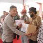 Kapolres Nganjuk AKBP Siswantoro beri Bansos paket sembako