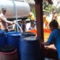 Polsek dan Koramil Ngasem berikan bantuan air bersih