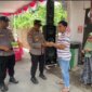 Polresta Sidoarjo di TPS bagi makanan gratis