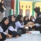 Kasi Humas Polres Probolinggo Iptu Merdhania Pravita Shanty berbagi makanan bergizi