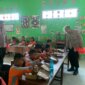 Polres Nganjuk berbagi makan siang bergizi di SDN 1 Wilangan