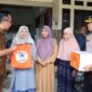 Kapolres Gresik AKBP Rovan Richard Mahenu dan Forkopimda salurkan bantuan ke korban banjir kali Lamong