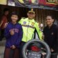 Kapolres Ponorogo AKBP Andin Wisnu bersama Pemudik