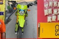 Pelaku diamankan Polisi beserta barang buktinya