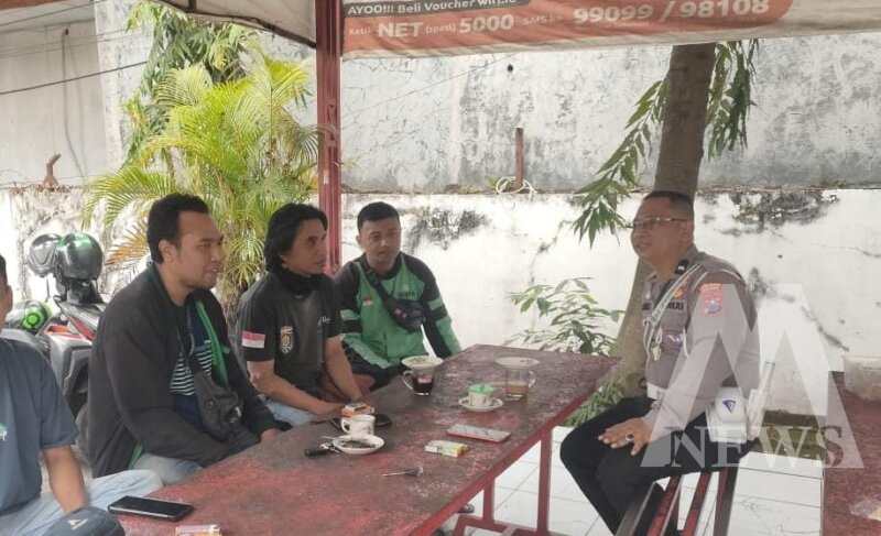 Satlantas Polres Ngawi ngopi bareng komunitas ojol