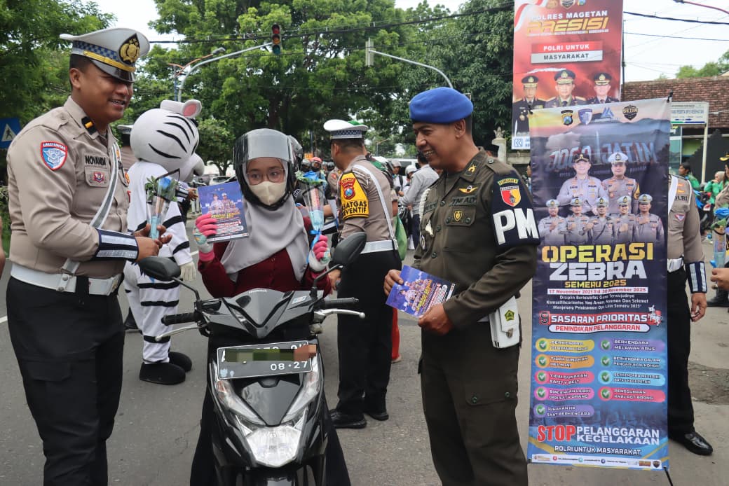 Polres Magetan berbagi bunga dan coklat