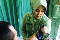 ‎Persit KCK saat cek KB gratis TMMD ke-128 Gresik