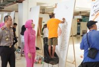 Kapolresta Malang Kota Kombespol Putu Kholis Aryana saat tinjau lomba mural di MCC