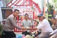 Kapolres Batu AKBP Dr Aris Purwanto saat resmikan Jembatan Merah Putih Presisi