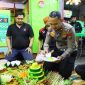 Kasatlantas Polresta Malang Kota Kompol Rio Angga Prasetyo saat potong tumpeng